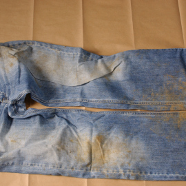 Mark's work jeans from 19 November 2009. These were forensically analysed for traces of the body or burial. None were found.